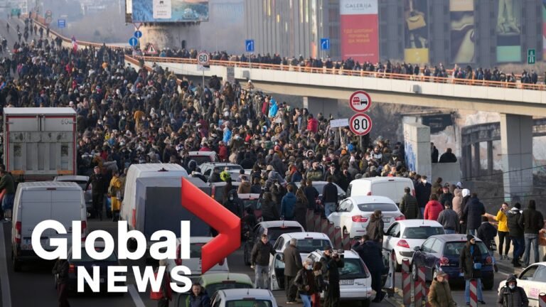 Thousands block Belgrade highway in protest over land, environment laws in Serbia